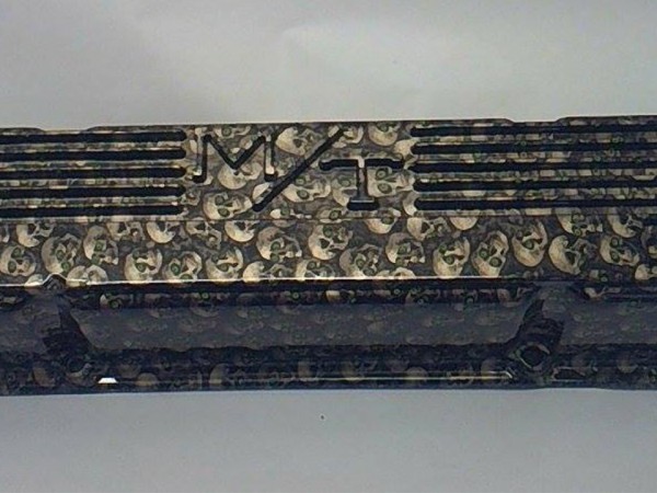 Custom hydro dipped valve cover with skull pattern