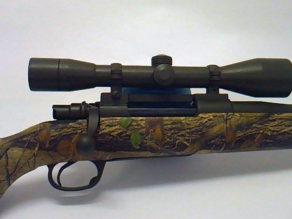 Cerakote rifle with camo hydro dipped stock